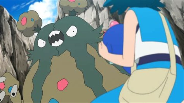 Garbodor towering menacingly.