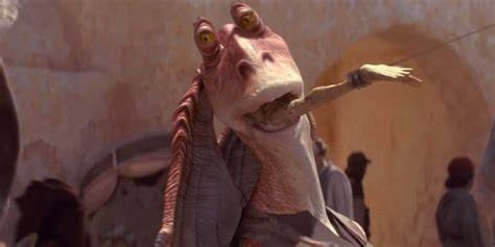 Jar Jar Binks has something in his mouth in Star Wars.